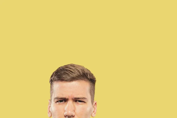 Caucasian young mans close up shot on yellow background — Stock Photo, Image
