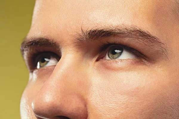 Caucasian young mans close up shot on yellow background — Stock Photo, Image