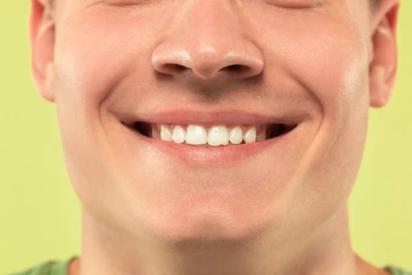 Caucasian young mans close up shot on green background — Stock Photo, Image