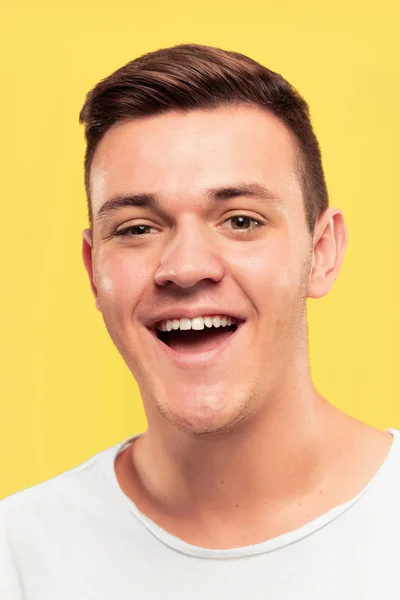 Caucasian young mans close up portrait on yellow background — Stock Photo, Image