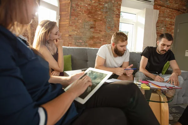 Group of young caucasian office workers have creative meeting to discuss new ideas — Stock Photo, Image