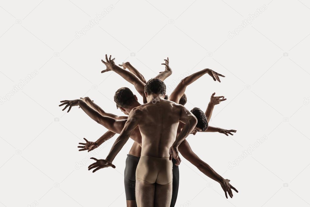 The group of modern ballet dancers. Contemporary art ballet. Young flexible athletic men and women.