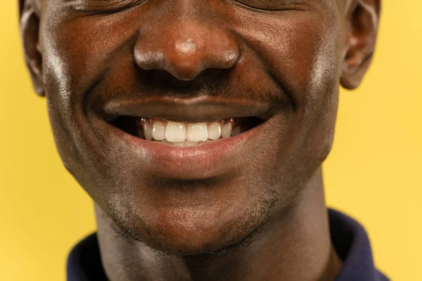 African-american young mans close up portrait on yellow background — ストック写真