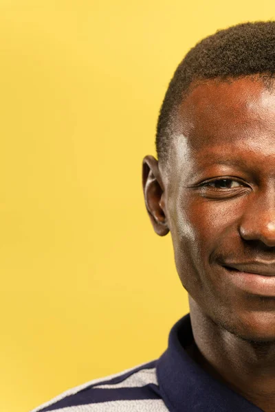 African-american young mans close up portrait on yellow background — ストック写真