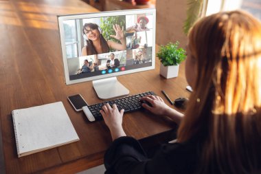 Woman participate video conference looking at laptop screen during virtual meeting, videocall webcam app for business, close up clipart