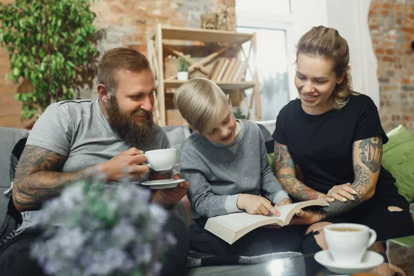 Happy family at home spending time together. Having fun, look cheerful and lovely. — Stock Photo, Image