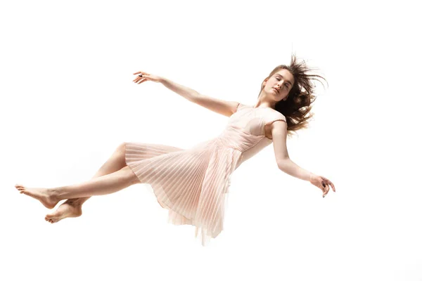 Mid-air beauty. Full length studio shot of attractive young woman hovering in air and keeping eyes closed — Stock Photo, Image