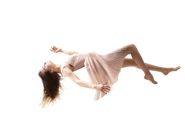 Mid-air beauty. Full length studio shot of attractive young woman hovering in air and keeping eyes closed — Stock Photo, Image