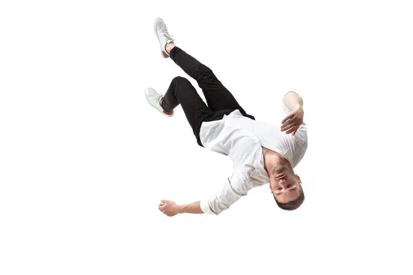Mid-air beauty. Full length studio shot of attractive young man hovering in air and keeping eyes closed — Stock Photo, Image