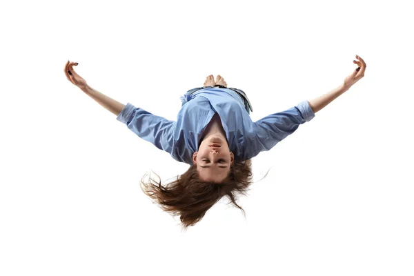 Mid-air beauty. Full length studio shot of attractive young woman hovering in air and keeping eyes closed — Stock Photo, Image