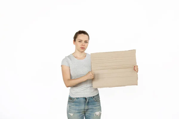 Young woman protesting with blank board, sign isolated on white studio background — Stock Photo, Image