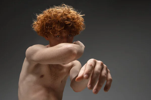 Portrait of beautiful redhead man isolated on grey studio background. Concept of beauty, skin care, fashion and style — Stock Photo, Image