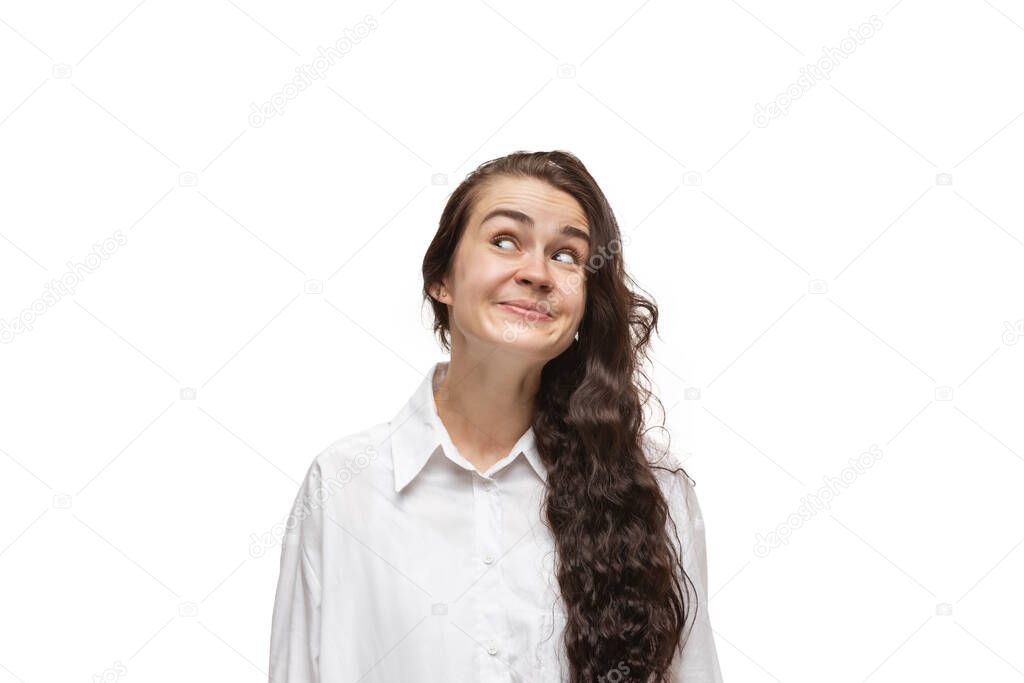 Young caucasian woman with funny, unusual popular emotions and gestures isolated on white studio background