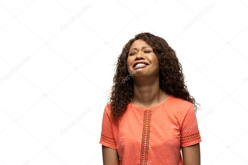Young african-american woman with funny, unusual popular emotions and gestures isolated on white studio background