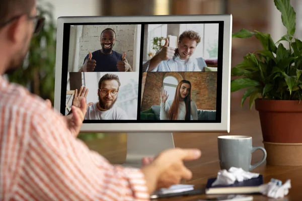 Remote meeting. Man working from home during coronavirus or COVID-19 quarantine, remote office concept. — Stock Photo, Image