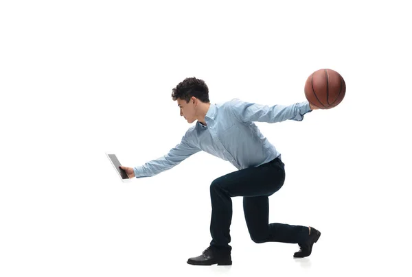 Man in office clothes playing basketball on white background. Unusual look for businessman in motion, action. Sport, healthy lifestyle. — Stock Photo, Image