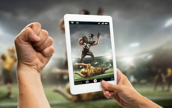 Close up hands holding tablet viewing sport, online translation, streaming of championship — Stock Photo, Image