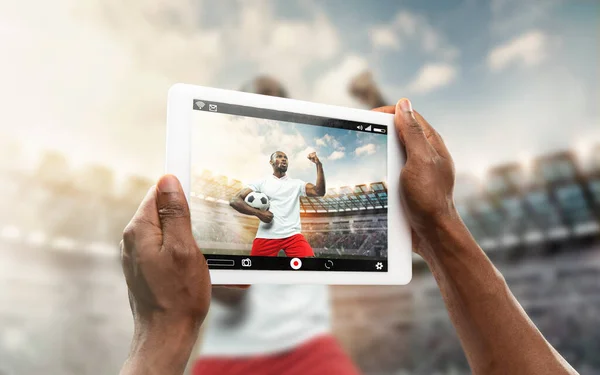Close up hands holding tablet viewing sport, online translation, streaming of championship — Stock Photo, Image