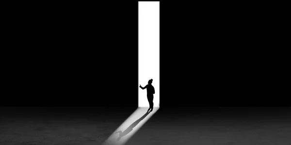 Silhouette dell'uomo che cammina nella notte verso la luce, vista dall'alto — Foto Stock