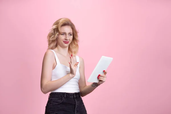 Caucasian young womans portrait isolated on pink studio background. Beautiful female model. Concept of human emotions, facial expression, sales, ad, youth culture. — Stock Photo, Image