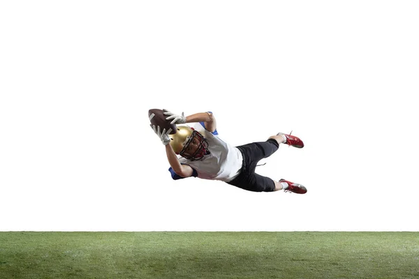 Jogador de futebol americano em ação isolado no fundo do estúdio branco — Fotografia de Stock