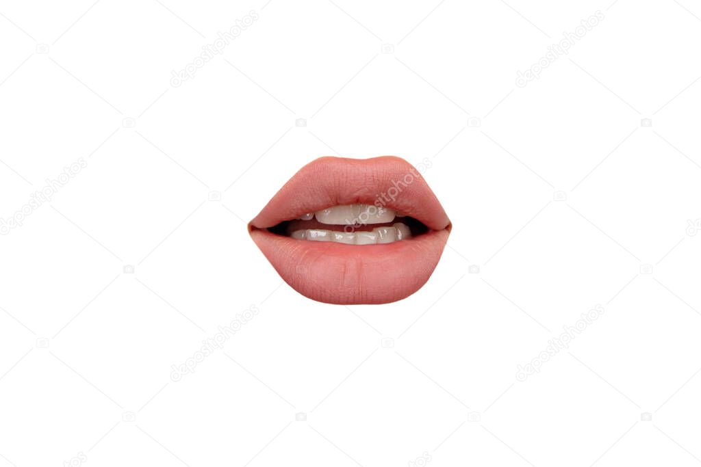 Close up view of female mouth wearing nude lipstick isolated over white studio background