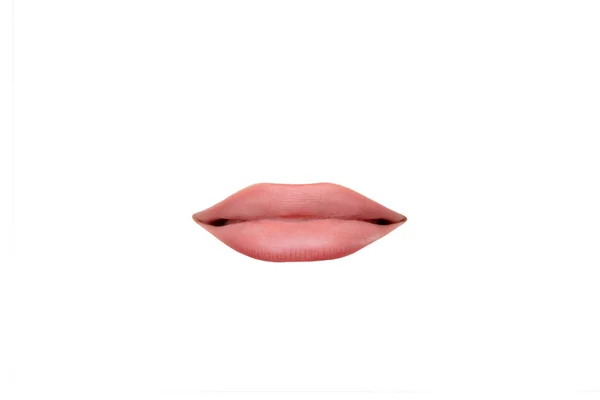 Close up view of female mouth wearing nude lipstick isolated over white studio background — Stock Photo, Image