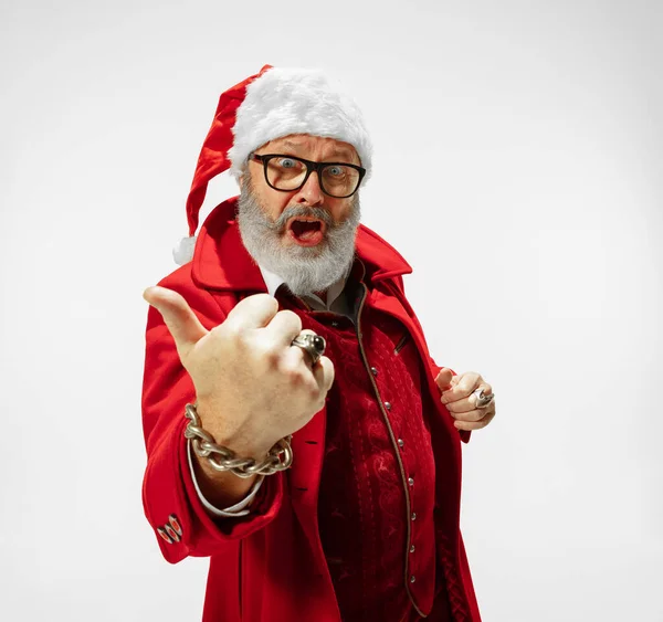 Modern stylish Santa Claus in red fashionable suit isolated on white background — Stock Photo, Image