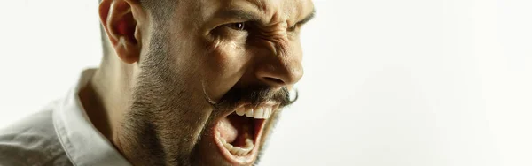 Caucasian young mans close up cropped shot on studio background, flyer — Stock Photo, Image