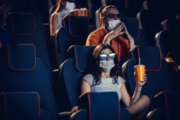 Cinema, movie theatre during quarantine. Coronavirus pandemic safety rules, social distance during movie watching — Stock Photo, Image