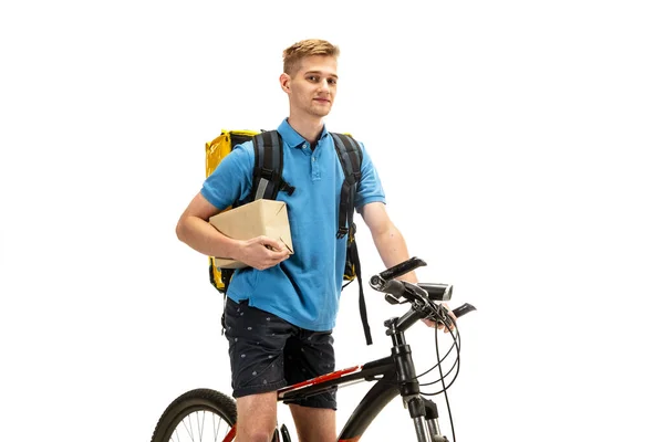 Deliveryman isolated on white studio background. Contacless delivery service during quarantine. — Stock Photo, Image