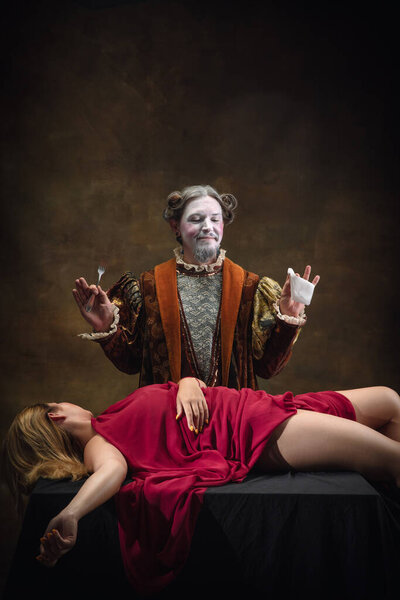 Young man as Johann Sebastian Bach on dark green background. Retro style, comparison of eras concept.