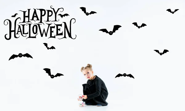 Little girl as vampire on white background, halloween time, flyer with copyspace — Stock Photo, Image