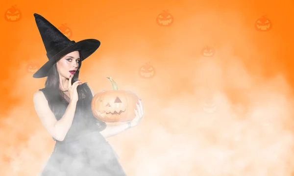 Young woman a witch on scary background — Stock Photo, Image