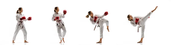 Confident junior in kimono practicing taekwondo combat, martial arts — Stock Photo, Image