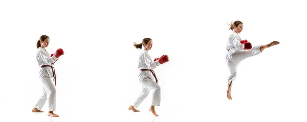 Sebevědomý junior v kimonu cvičí taekwondo boj, bojová umění — Stock fotografie