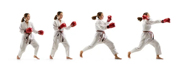 Zelfverzekerde junior in kimono beoefenen taekwondo gevechten, vechtsporten — Stockfoto