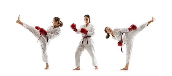 Confident junior in kimono practicing taekwondo combat, martial arts — Stock Photo, Image