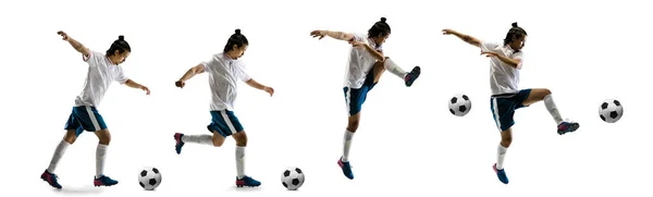 Jugador de fútbol seguro en movimiento y acción aislado sobre fondo blanco, pateando la pelota en dinámica — Foto de Stock