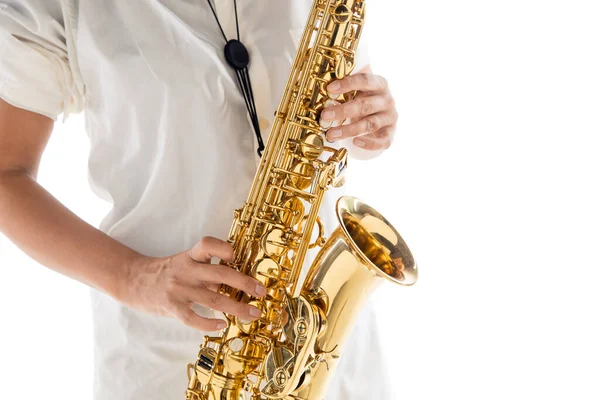 Close up woman playing saxophone isolated on white studio background — Stock Photo, Image