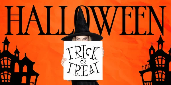 Young woman in hat as a witch on scary orange background — Stock Photo, Image