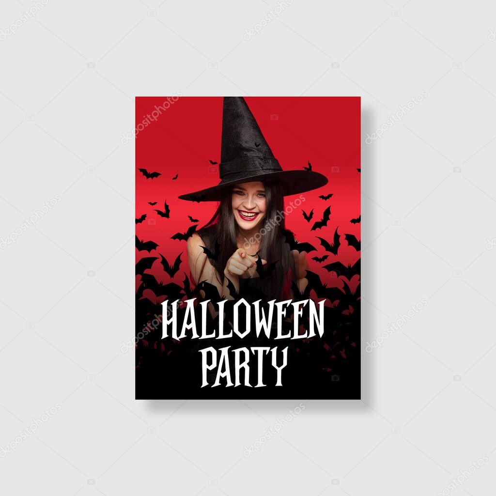 Young woman in hat as a witch on scary red background