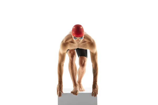 Caucasian professional sportsman, swimmer training isolated on white studio background — Stock Photo, Image