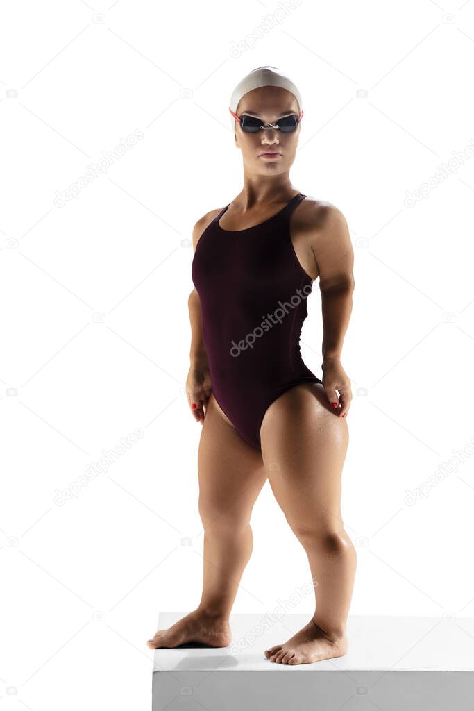 Beautiful dwarf woman practicing in swimming isolated on white background