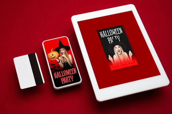 Young woman in hat as a witch on device screen and red background, mock up with copyspace — Stock Photo, Image