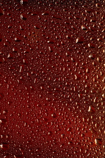 Vista de perto de gotas frias no copo de cerveja — Fotografia de Stock