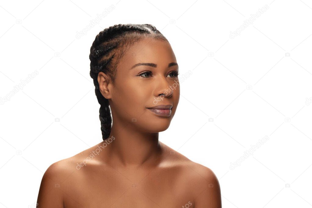 Portrait of beautiful african-american woman isolated on white studio background. Beauty, fashion, skincare, cosmetics concept.