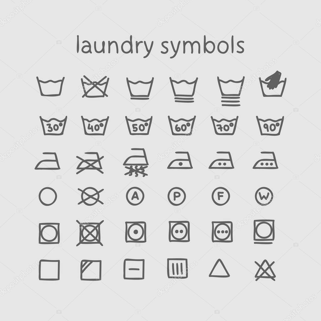Vector laundry icons, info on clothes. Hand drawing style isolated on a white background.