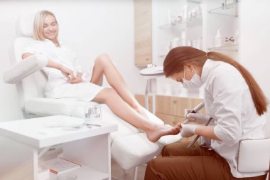 İstemciler ayak gülümseyen için yordam yapmadan ayak hastalıkları uzmanı.