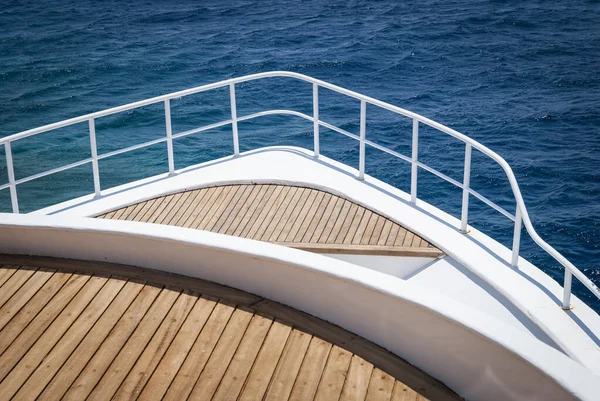 dive boat in the Red sea with blue ocean and wood deck
